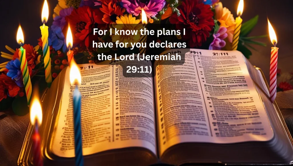 Open Bible with birthday candles showing scripture verses for daughter prayers