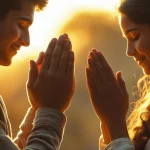 Couple sharing good morning prayer message during peaceful sunrise moment